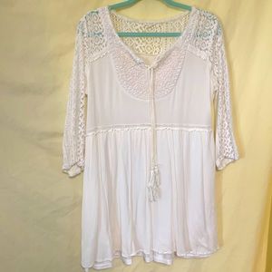 Cream-colored tunic top size medium